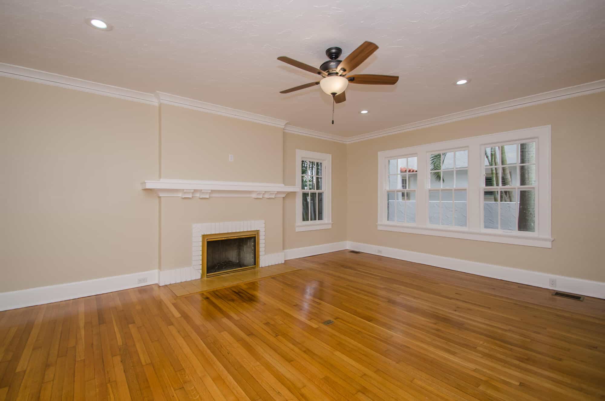 Historic St Petersburg living room renovation with hardwood floors