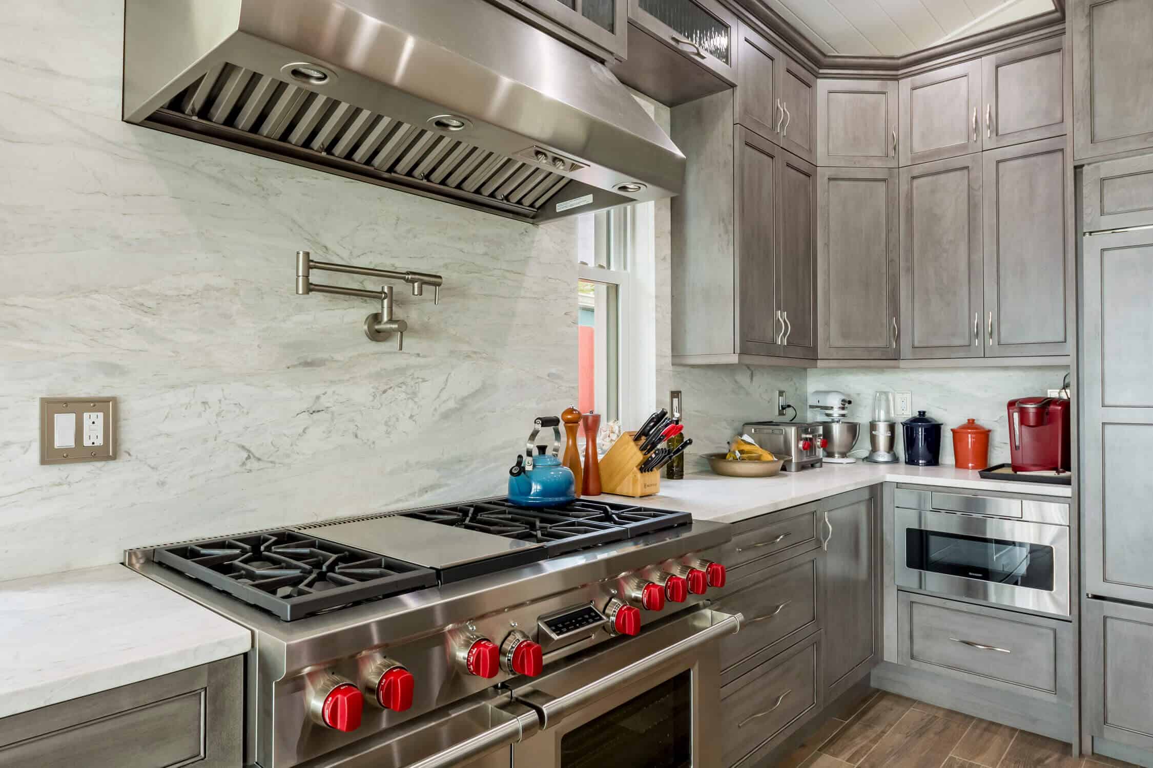 Kitchen remodel featuring marble backsplash in Tampa Bay Florida