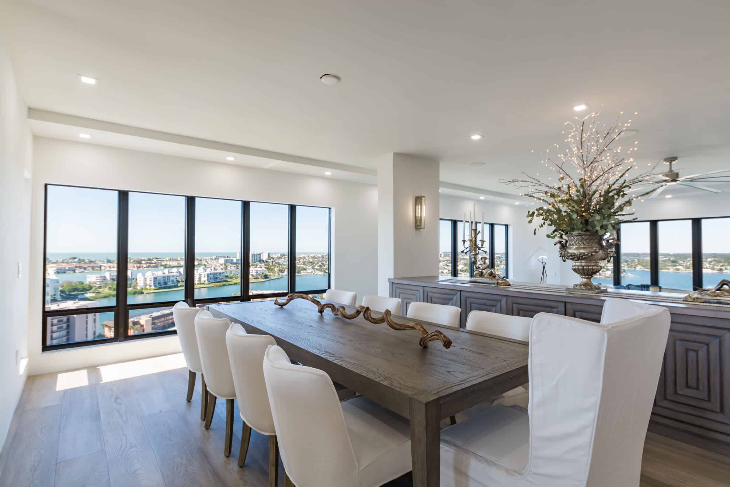 St Petersburg condo dining room opening into remodeled living space