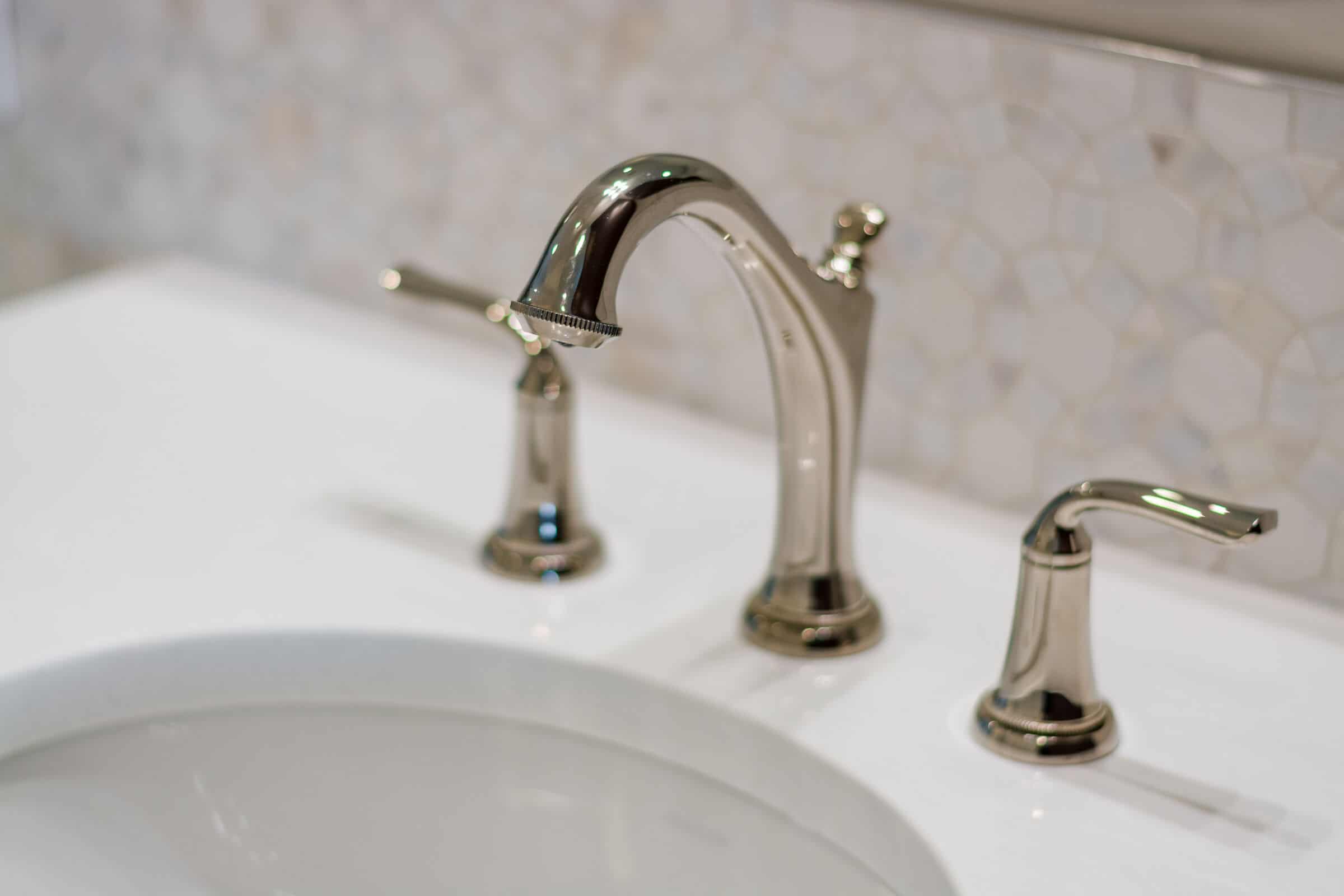 Polished nickel faucets in Tampa bathroom remodel