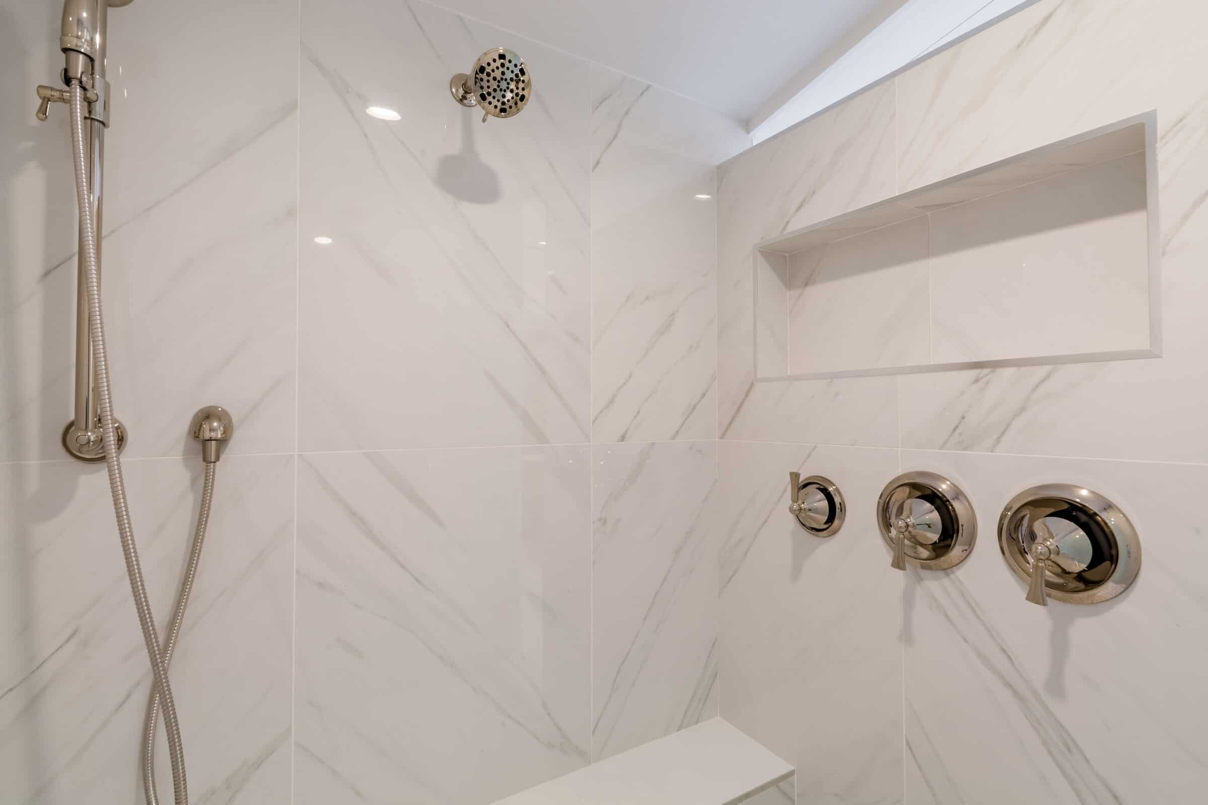 Large porcelain shower walls in Tampa bathroom remodel