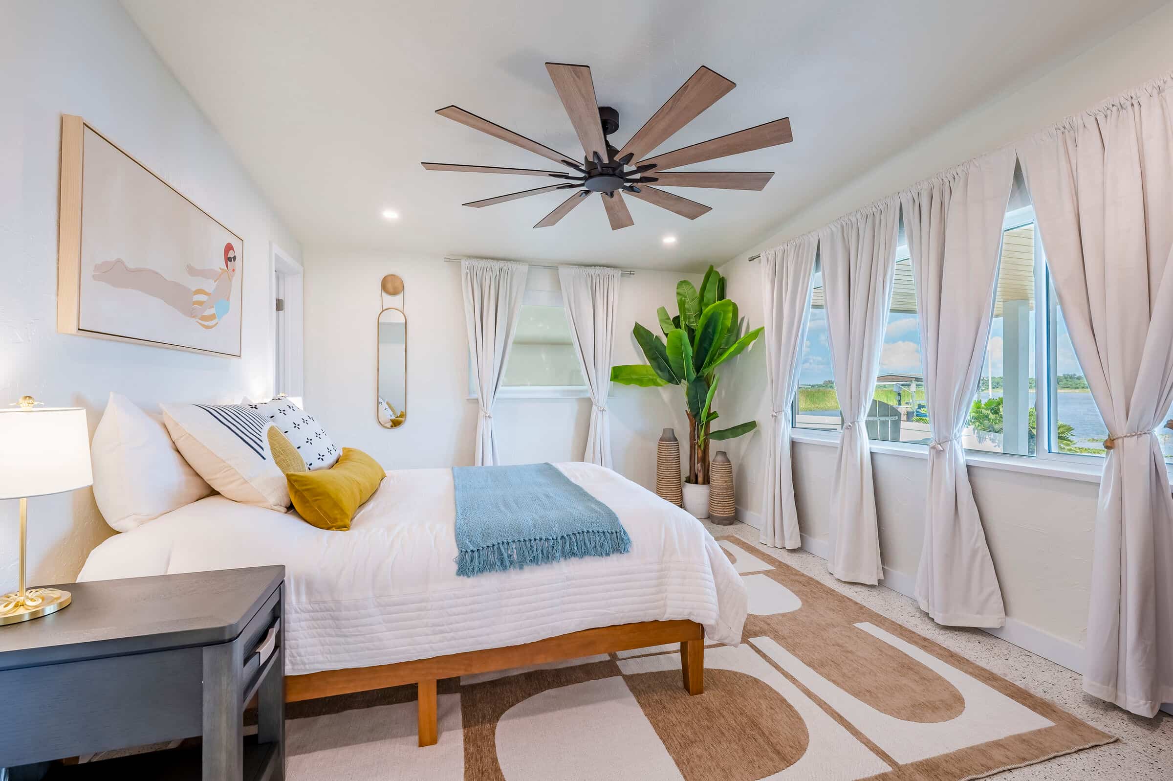Finished bedroom with ceiling fan
