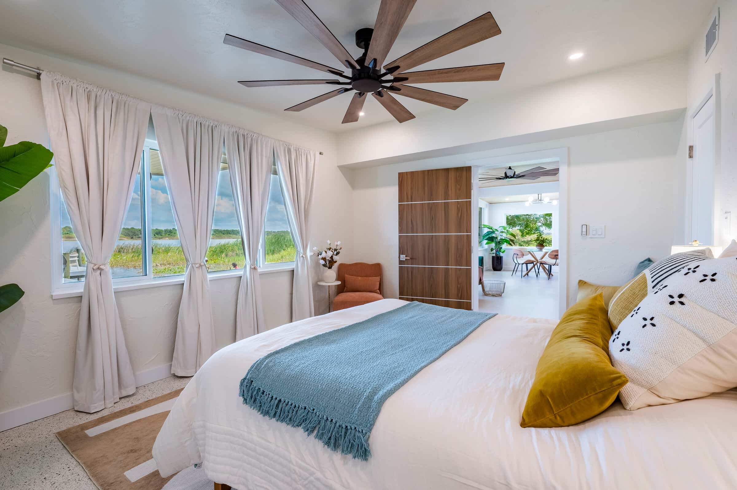 Bright bedroom with large windows