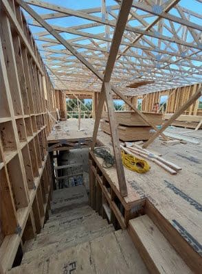 Clearwater Beach Home Builder shows stairwell to second floor
